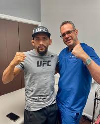 Garrett and MMA fighter Dr Garrett with an MMA fighter
